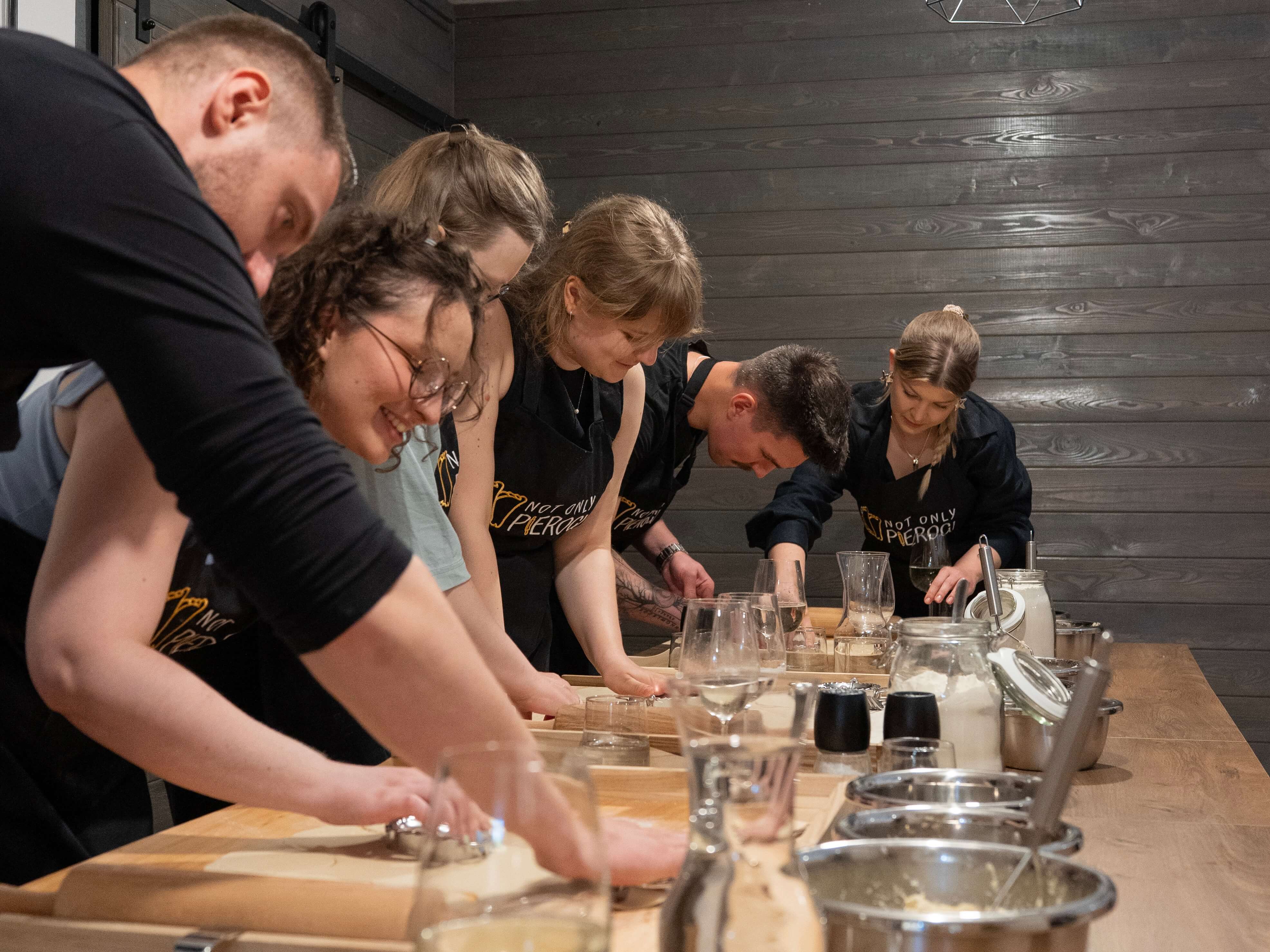 Team working together during pierogi class